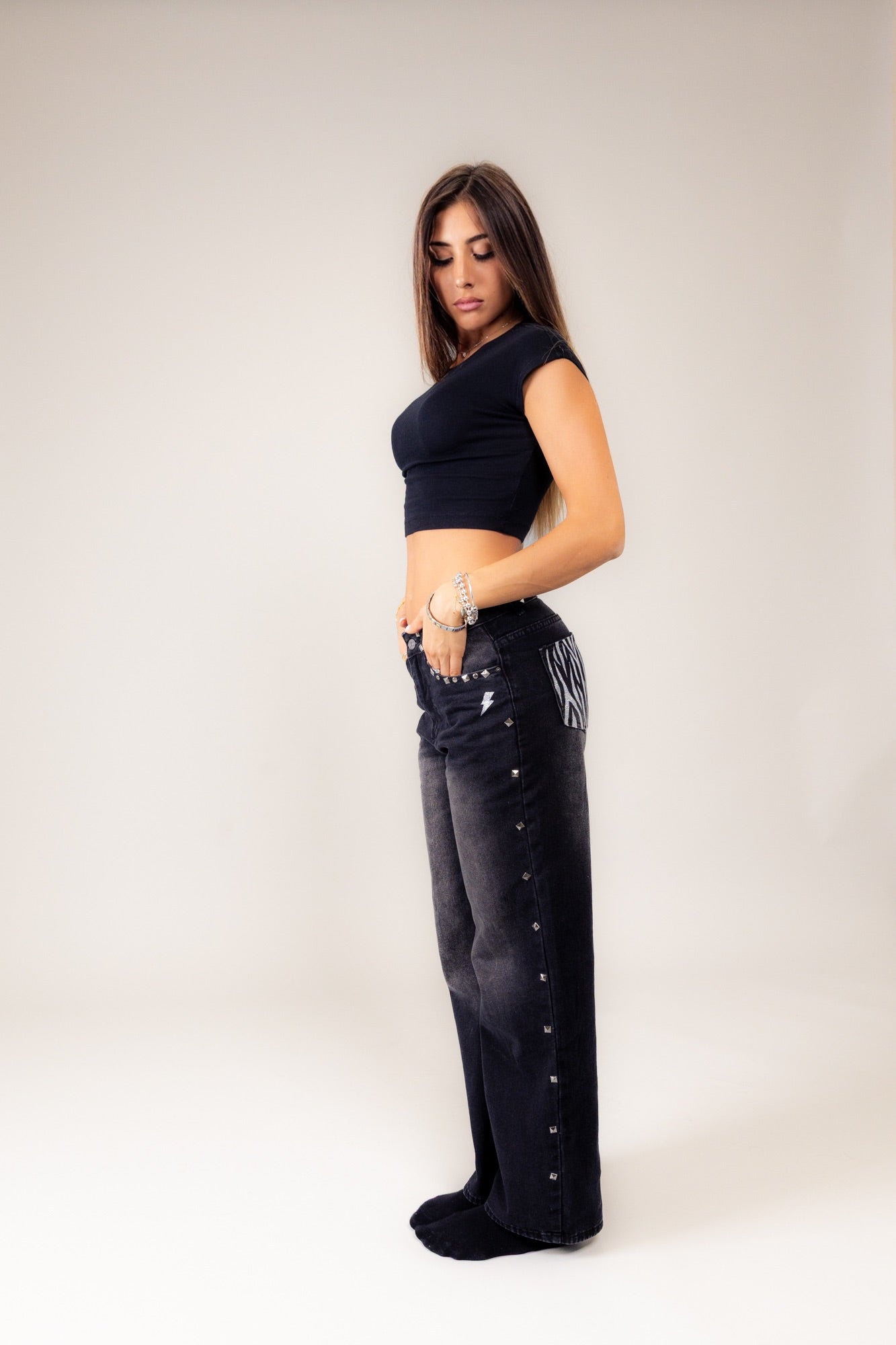 Jeans nero slavato zebato argento