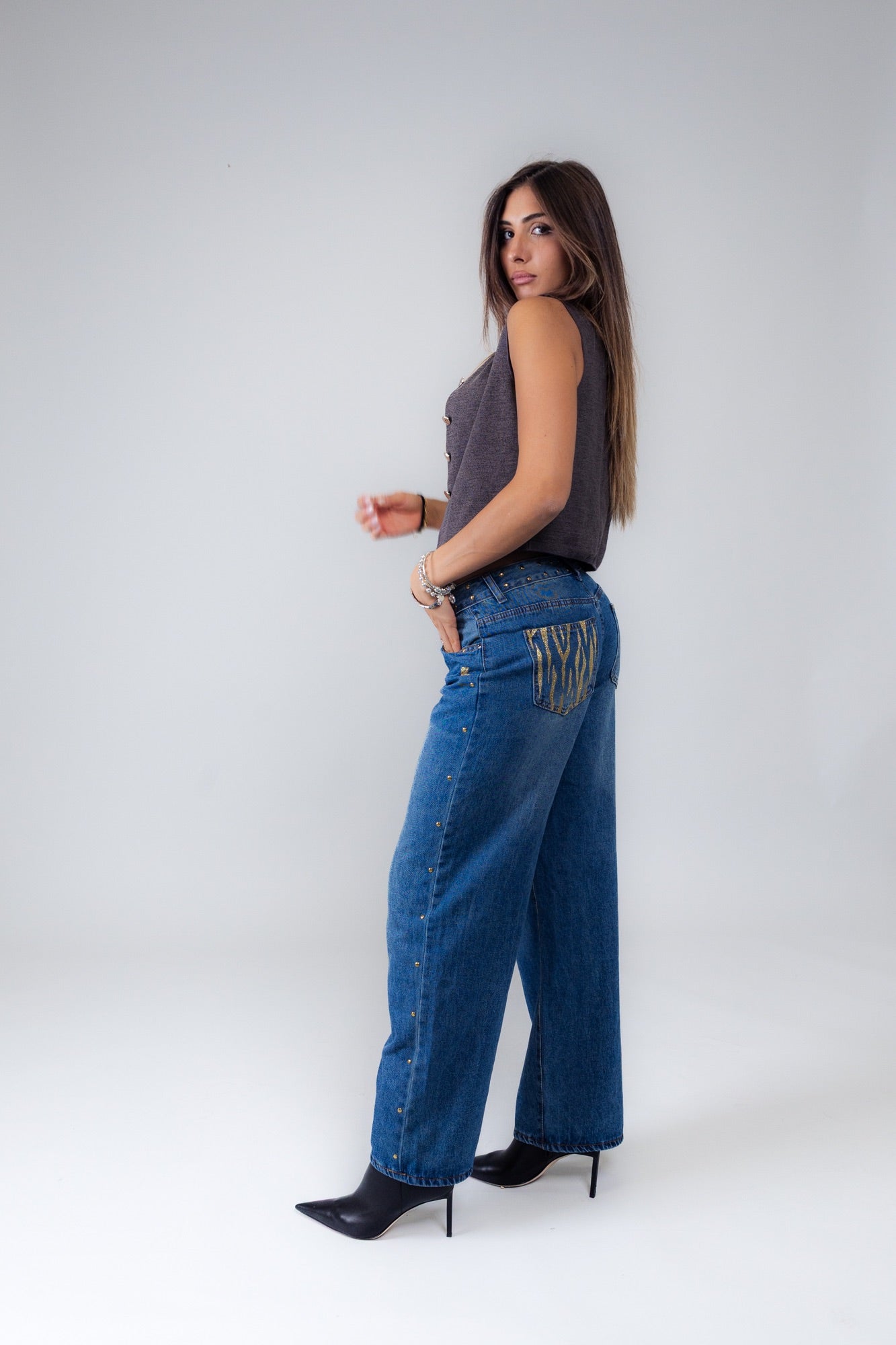 Jeans blu tasca zebrata oro
