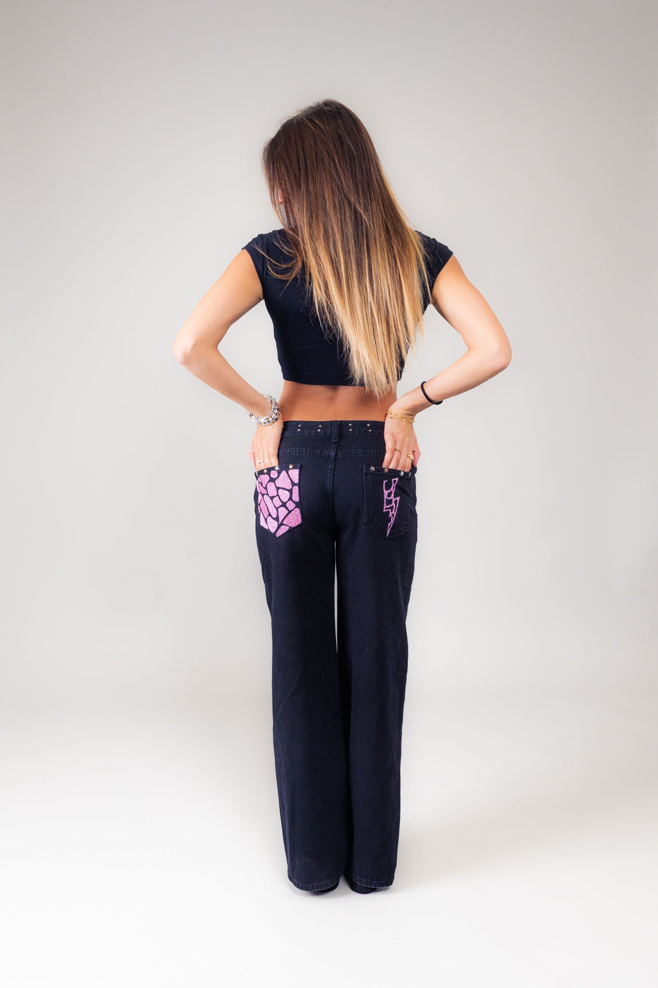 Jeans nero giraffato rosa