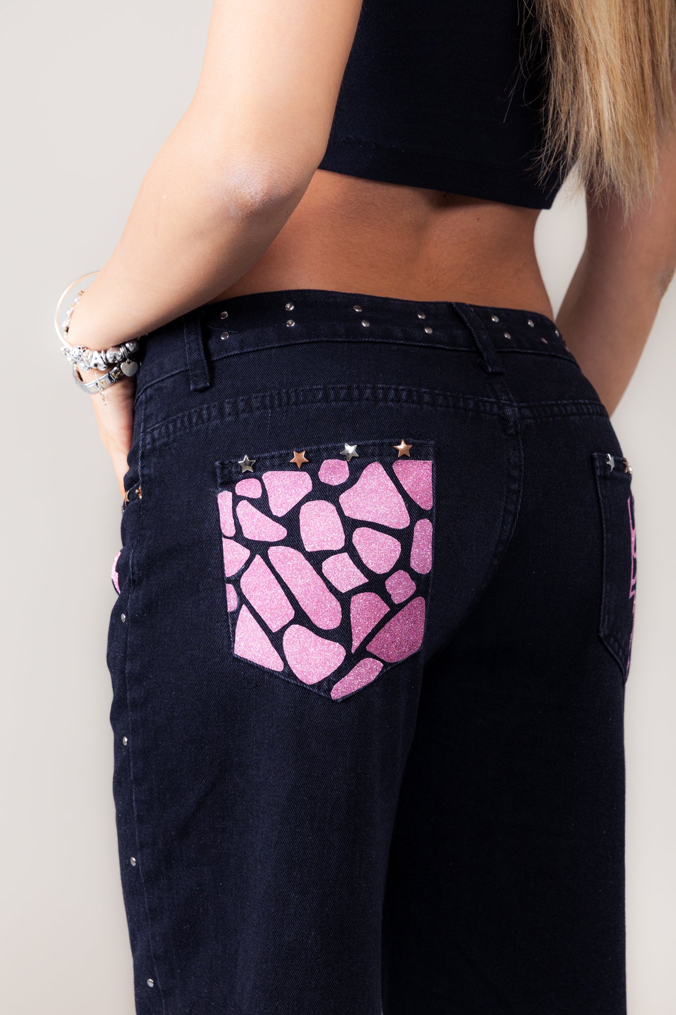 Jeans nero giraffato rosa