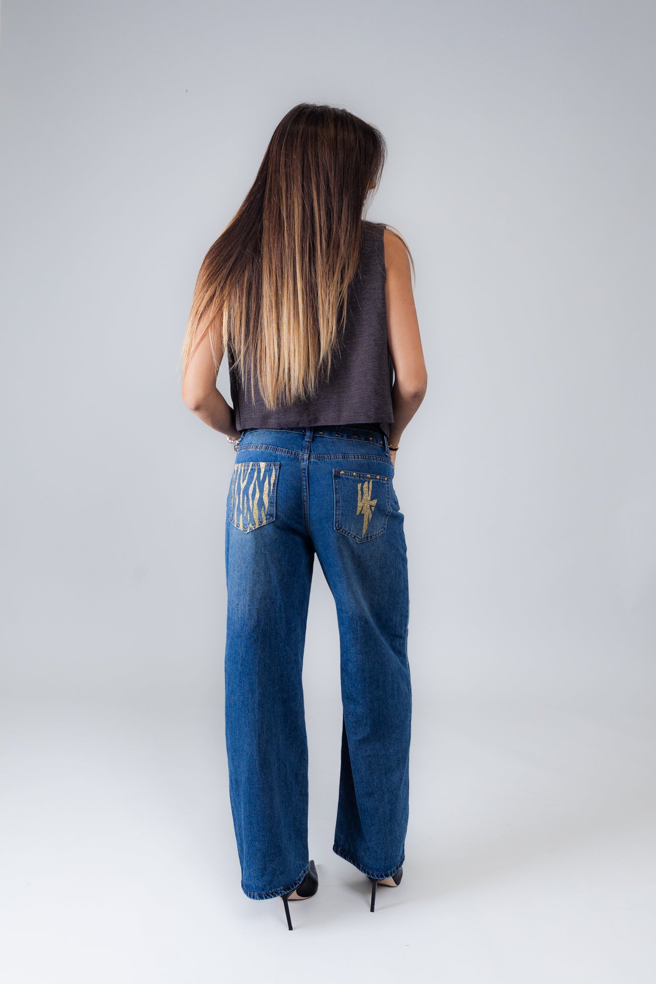 Jeans blu tasca zebrata oro