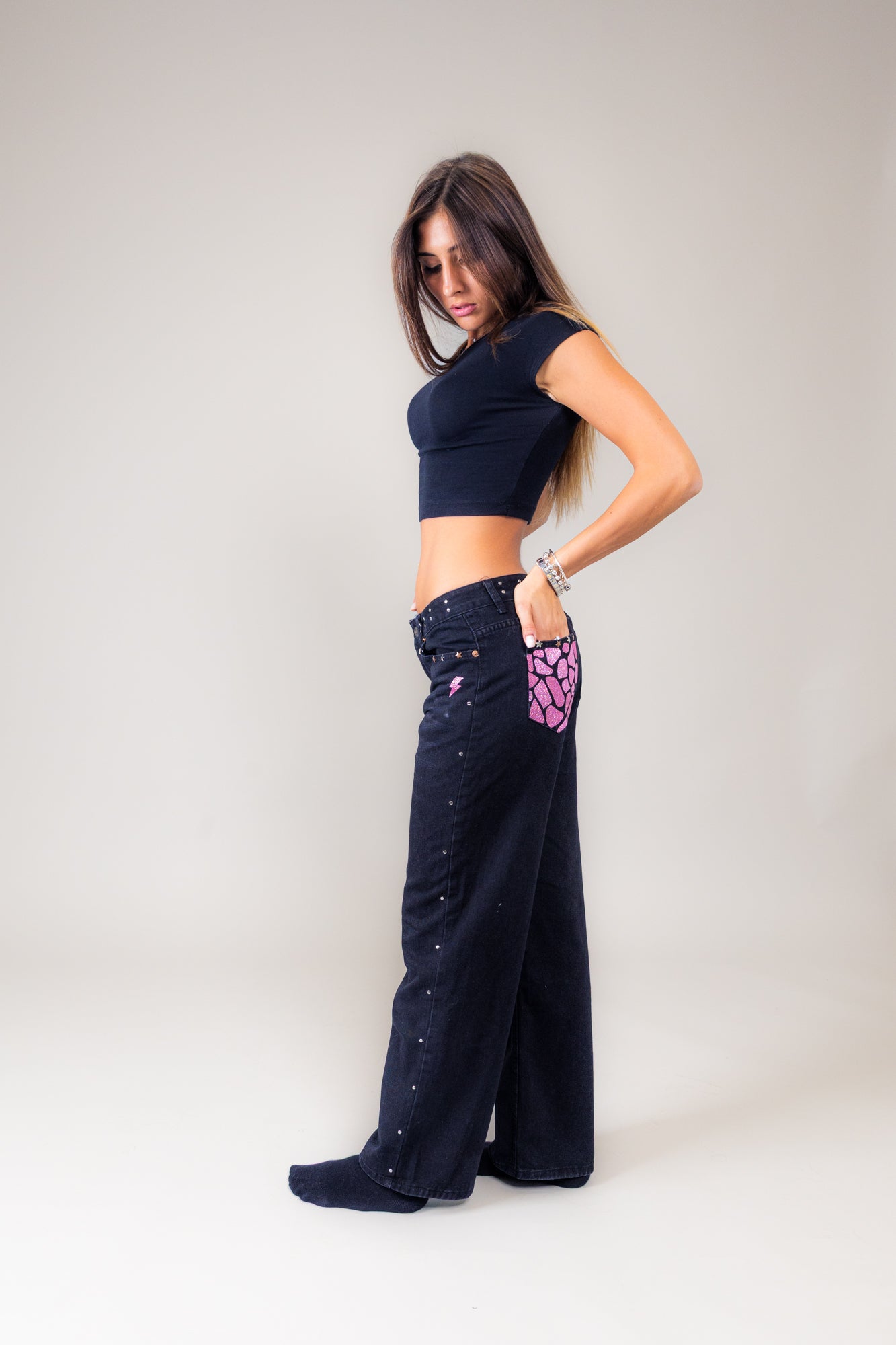 Jeans nero giraffato rosa